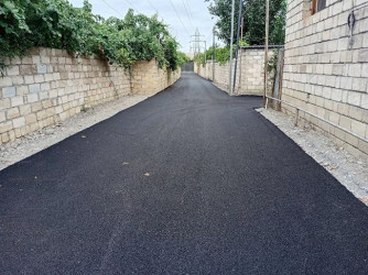 Mingəçevir şəhərinin küçə döngələri və ara yollarına asfalt döşəmməsi işləri davam edir