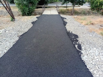 Mingəçevir şəhərinin küçə döngələri və ara yollarına asfalt döşəmməsi işləri davam edir
