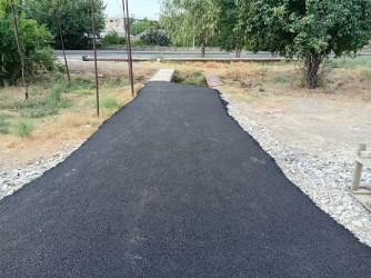 Mingəçevir şəhərinin küçə döngələri və ara yollarına asfalt döşəmməsi işləri davam edir