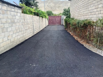 Mingəçevir şəhərinin küçə döngələri və ara yollarına asfalt döşəmməsi işləri davam edir